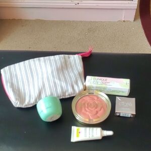 Clinique Skincare and Makeup Set with Striped Pouch 6 Piece Set.